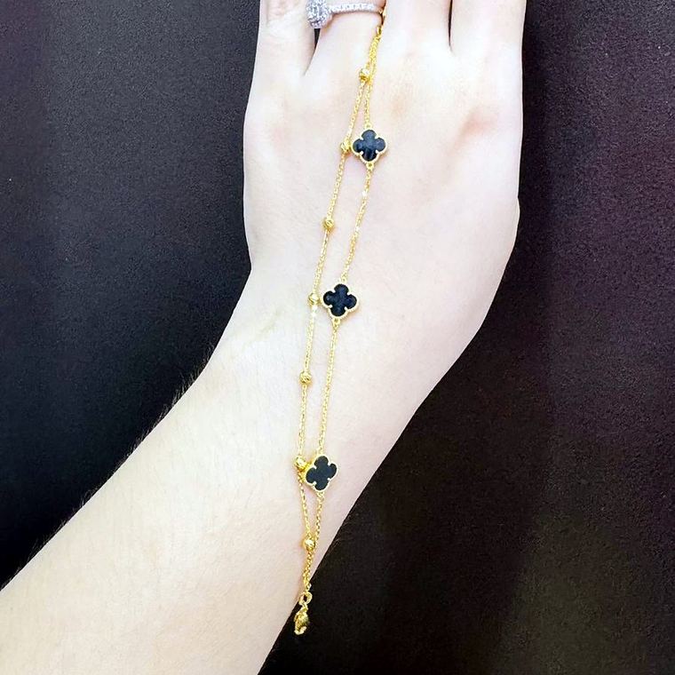 Lắc tay cỏ 4 lá đen